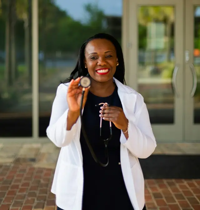 A smiling doctor with a stethoscope